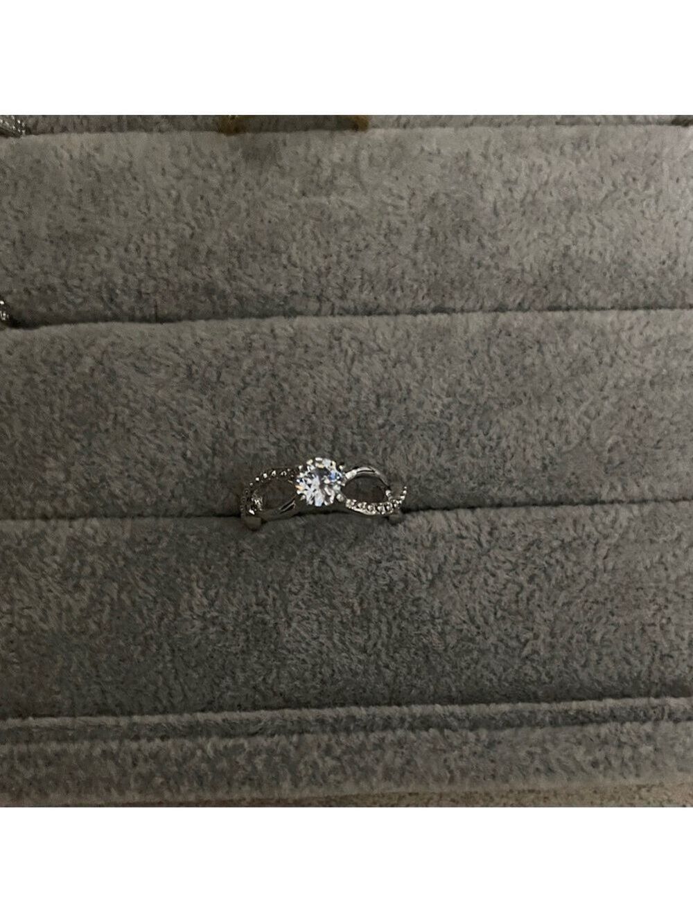 Dazzling Silver Ring with Central Stone
